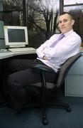 2 February 2006; Dublin footballer Ciaran Whelan sits in his office at Allianz Ireland. Burlington House, Burlington Road, Dublin. Picture credit; Brian Lawless / SPORTSFILE