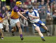 19 February 2006; Jack Kennedy, Waterford, in action against Eoin Quigley, Wexford. Allianz National Hurling League, Division 1A, Round 1, Waterford v Wexford, Dungarvan, Co. Waterford. Picture credit: Matt Browne / SPORTSFILE