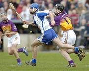 19 February 2006; Michael Walsh, Waterford, in action against Michael Jacob, Wexford. Allianz National Hurling League, Division 1A, Round 1, Waterford v Wexford, Dungarvan, Co. Waterford. Picture credit: Matt Browne / SPORTSFILE