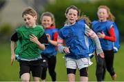 1 May 2014; Padraig O'Dwyer, aged 8, left, and Molly O'Mara, aged 11, in action during the Forest Feast Little Athletics Jamboree. Community Centre, Moyglass Village, Co. Tipperary. Picture credit: Diarmuid Greene / SPORTSFILE