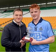 3 May 2014; Dublin's Conor McHugh, who scored 1-6, is presented with the Man of the Match Award by Eoin Kellett, Grocery Sales Director, Kraft Foods Ireland. Cadbury GAA Football All-Ireland U21 Championship Final, Dublin v Roscommon, O'Connor Park, Tullamore, Co. Offaly. Picture credit: Ray McManus / SPORTSFILE