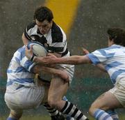 3 March 2006; Cian Healy, Belvedere College, is tackled by David O'Brien, left, and Andrew Cullen, right, Blackrock College. Leinster Schools Senior Cup, Semi-Final, Belvedere College v Blackrock College, Lansdowne Road, Dublin. Picture credit: Pat Murphy / SPORTSFILE