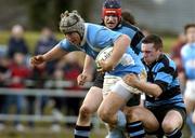 4 March 2006; Anthony Kavanagh, Garryowen, is tackled by David Delaney, Shannon. AIB League 2005-2006, Division 1, Garryowen v Shannon, Dooradoyle, Limerick. Picture credit: Matt Browne / SPORTSFILE