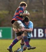 4 March 2006; Alan Trenier, Clontarf, is tackled by Niall Kearns, UCD. AIB League 2005-2006, Division 1, UCD v Clontarf, Belfield Bowl, UCD, Dublin. Picture credit: Damien Eagers / SPORTSFILE