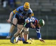 4 March 2006; Andy Smith, UCD, in action against Keith Rossiter, Waterford IT. Datapac Fitzgibbon Cup Final, UCD v Waterford IT, Pairc Ui Rinn, Cork. Picture credit: Brendan Moran / SPORTSFILE