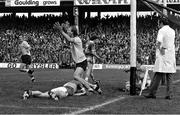 26 September 1976; Dublin's Brian Mullins celebrates after scoring his side's goal past Kerry goalkeeper Charlie Neligan. All-Ireland Football Final, Dublin v Kerry, Croke Park, Dublin. Picture credit: Connolly Collection / SPORTSFILE