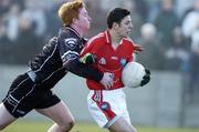 5 March 2006; Trevor O'Brien, Louth, is tackled by Ross Donavan, Sligo. Allianz National Football League, Division 2B, Round 3, Louth v Sligo, Clanna Gael Park, Dundalk, Co. Louth. Picture credit: Matt Browne / SPORTSFILE