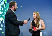 7 May 2014; Shannon and Ireland's Nicole Cronin, winner of the inaugural BNY Mellon Women’s Sevens Player of the Year 2014 award, is interviewed by MC Scott Quinnell. Hibernia College IRUPA Rugby Player Awards 2014, Burlington Hotel, Dublin. Picture credit: Brendan Moran / SPORTSFILE