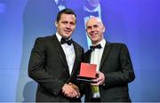 7 May 2014; Munster's James Coughlan is presented with the O2 Unsung Hero award 2014 by Eugene Mitchell, Marketing Director, O2, at the Hibernia College IRUPA Rugby Player Awards 2014. Hibernia College IRUPA Rugby Player Awards 2014, Burlington Hotel, Dublin. Picture credit: Brendan Moran / SPORTSFILE