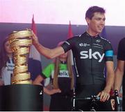 8 May 2014; Philip Deignan, Team Sky, with the Giro D'Italia trophy 'Trofeo Senza Fine' during the Giro d'Italia opening cermony. City Hall, Belfast, Co. Antrim. Picture credit: Stephen McCarthy / SPORTSFILE