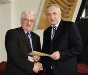 6 March 2006; An Taoiseach, Bertie Ahern, TD, who presented a certificate to John Manning one of the first Sports Stadium Stewards to have qualified under a new scheme set up by the GAA, the FAI and the IRFU and coordinated by FETAC. Croke Park, Dublin. Picture credit: Ray McManus / SPORTSFILE