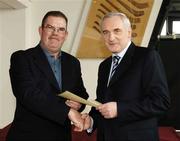 6 March 2006; An Taoiseach, Bertie Ahern, TD, who presented a certificate to Joe O'Brien one of the first Sports Stadium Stewards to have qualified under a new scheme set up by the GAA, the FAI and the IRFU and coordinated by FETAC. Croke Park, Dublin. Picture credit: Ray McManus / SPORTSFILE