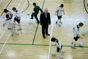 8 March 2006; Minister of State, at the Department of Community, Rural and Gaeltacht, Noel Ahern, T.D. at a photocall to introduce a new initiative appointing seven new Football Community Development Officers in the Dublin City area. St Michael’s VEC Sports Hall, Inchicore, Dublin. Picture credit; David Maher / SPORTSFILE