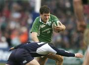 11 March 2006; Gordon D'Arcy, Ireland, is tackled by Sean Lamont, Scotland. RBS 6 Nations 2005-2006, Ireland v Scotland, Lansdowne Road, Dublin. Picture credit: Brendan Moran / SPORTSFILE