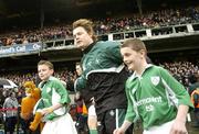 11 March 2006; Ireland captain Brian O'Driscoll and mascots Liam O'Dea and Daniel Trayers, lead the team out before the game. RBS 6 Nations 2005-2006, Ireland v Scotland, Lansdowne Road, Dublin. Picture credit: Brendan Moran / SPORTSFILE