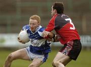 12 March 2006; Michael Lawlor, Laois, in action against Brendan Grant, Down. Allianz National Football League, Division 1B, Round 4, Laois v Down, O'Moore Park, Portlaoise, Co. Laois. Picture credit: Damien Eagers / SPORTSFILE