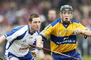 12 March 2006; Colm Forde, Clare, in action against Ken McGrath, Waterford. Allianz National Hurling League, Division 1A, Round 3, Waterford v Clare, Fraher Field, Dungarvan, Co. Waterford. Picture credit: Matt Browne / SPORTSFILE