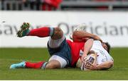 10 May 2014; Ulster's Michael Heaney reaches back to score his side's first try despite being tackled by Casey Laulala, Munster. Celtic League 2013/14, Round 22, Munster v Ulster, Thomond Park, Limerick. Picture credit: John Dickson / SPORTSFILE