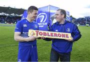 10 May 2014; Jarrod Bromley, of the Official Leinster Supporters Club, makes a presentation to Leinster's Brian O'Driscoll after the match, his last regular season home game before he retires from professional rugby. Celtic League 2013/14, Round 22, Leinster v Edinburgh, RDS, Ballsbridge, Dublin. Picture credit: Brendan Moran / SPORTSFILE