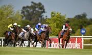 11 May 2014; Afternoon Sunlight, right, with Pat Smullen up, on races ahead of the field on their way to winning The Derrinstown Stud 1,000 Guineas Trial. Horse Racing from Leopardstown, Co. Dublin. Picture credit: Barry Cregg / SPORTSFILE