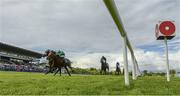 11 May 2014; Ebanoran, right, with Declan McDonogh up, passes the finishing post ahead of Fascinating Rock, left, with PJ Smullen, by a head to win The Derrinstown Stud Derby Trial Stakes. The result was reversed after a stewards inquiry giving Fascinating Rock the win. Horse Racing from Leopardstown, Co. Dublin. Picture credit: Barry Cregg / SPORTSFILE