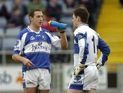 12 March 2006; Darren Rooney, Laois, speaks to Laois goalkeeper Fergal Byron as he takes a drink. Allianz National Football League, Division 1B, Round 4, Laois v Down, O'Moore Park, Portlaoise, Co. Laois. Picture credit: Damien Eagers / SPORTSFILE