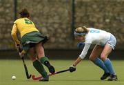 17 March 2006; Cathy Kenefick, Railway Union, is tackled by Fyona Flinn, UCD. Ladies Senior Cup Final, UCD v Railway Union, Three Rock Rovers, Grange Road, Rathfarnham, Dublin. Picture credit: Ciara Lyster / SPORTSFILE