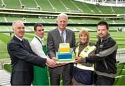 14 May 2014; Martin Murphy, Aviva Stadium Director, centre, with, from left, Bill Enright, Head of Operations and facilities, Aviva Stadium, Dara D'Arcy, Compass Group, Bernadette Coyne, Aviva Steward, and Darren Hayes, Aviva Stadium groundsman, are pictured pitchside at the Aviva Stadium today with a cake specially commissioned by Aviva Insurance for the occasion of the Aviva Stadium’s 4th Birthday. The Stadium was officially opened on the 14th May 2010, with the first match at the stadium taking place between Manchester United and a League of Ireland XI in August. Aviva Stadium, Lansdowne Road, Dublin. Picture credit: Pat Murphy / SPORTSFILE