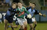 25 March 2006; Ger Brady, Mayo, in action against Paul Griffin, left, and Bryan Cullen, Dublin. Allianz National Football League, Division 1A, Round 6, Dublin v Mayo, Parnell Park, Dublin. Picture credit: Matt Browne / SPORTSFILE