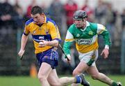 26 March 2006; Diarmuid McMahon, Clare, in action against Paul Cleary, Offaly. Allianz National Hurling League, Division 1A, Round 4, Clare v Offaly, Cusack Park, Ennis, Co. Clare. Picture credit: Kieran Clancy / SPORTSFILE