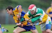 26 March 2006; Brian O'Connell, Clare, in action against Aidan Hanrahan, Offaly. Allianz National Hurling League, Division 1A, Round 4, Clare v Offaly, Cusack Park, Ennis, Co. Clare. Picture credit: Kieran Clancy / SPORTSFILE