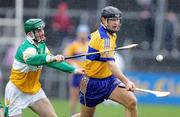 26 March 2006; Tony Carmody, Clare, in action against Gary Hanniffy, Offaly. Allianz National Hurling League, Division 1A, Round 4, Clare v Offaly, Cusack Park, Ennis, Co. Clare. Picture credit: Kieran Clancy / SPORTSFILE