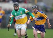 26 March 2006; Brendan Murphy, Offaly, in action against Jonathan Clancy, Clare. Allianz National Hurling League, Division 1A, Round 4, Clare v Offaly, Cusack Park, Ennis, Co. Clare. Picture credit: Kieran Clancy / SPORTSFILE
