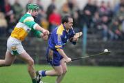 26 March 2006; David Fitzgerald, Clare, in action against Joe Bergin, Offaly. Allianz National Hurling League, Division 1A, Round 4, Clare v Offaly, Cusack Park, Ennis, Co. Clare. Picture credit: Kieran Clancy / SPORTSFILE