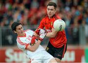 18 May 2014; Pauric McAnenly, Tyrone, in action against Killian McEvoy, Down. Ulster GAA Football Minor Championship Preliminary Round, Tyrone v Down, Healy Park, Omagh, Co. Tyrone. Picture credit: Oliver McVeigh / SPORTSFILE