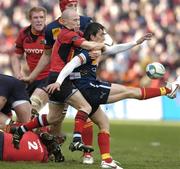 1 April 2006; Nicolas Durand, Perpignan, is tackled by Munster's Peter Stringer. Heineken Cup 2005-2006, Quarter-Final, Munster v Perpignan, Lansdowne Road, Dublin. Picture credit: Brendan Moran / SPORTSFILE