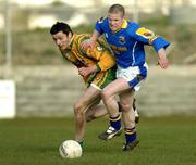 4 April 2006; Dermot Brady, Longford, in action against Christy Toye, Donegal. Allianz National Football League, Division 2A, Round 4, Donegal v Longford, Fr. Tierney Park, Ballyshannon, Donegal. Picture credit: Pat Murphy / SPORTSFILE