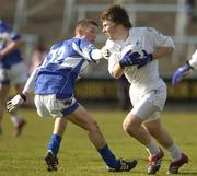 9 April 2006; Derek McCormack, Kildare, in action against Gary Kavanagh, Laois. Allianz National Football League, Division 1B, Round 7, Laois v Kildare, O'Moore Park, Portlaoise, Co. Laois. Picture credit: Brian Lawless / SPORTSFILE