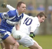 9 April 2006; Brian McCormack, Laois, in action against Karl Ennis, Kildare. Allianz National Football League, Division 1B, Round 7, Laois v Kildare, O'Moore Park, Portlaoise, Co. Laois. Picture credit: Brian Lawless / SPORTSFILE