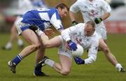 9 April 2006; Glenn Ryan, Kildare, in action against Noel Garvan, Laois. Allianz National Football League, Division 1B, Round 7, Laois v Kildare, O'Moore Park, Portlaoise, Co. Laois. Picture credit: Brian Lawless / SPORTSFILE