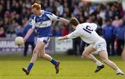 9 April 2006; Padraig Clancy, Laois, in action against Karl Ennis, Kildare. Allianz National Football League, Division 1B, Round 7, Laois v Kildare, O'Moore Park, Portlaoise, Co. Laois. Picture credit: Brian Lawless / SPORTSFILE