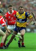 4 July 1999; Anthony Daly of Clare in action against Fergal McCormack of Cork during the Munster Senior Hurling Championship Final match between Cork and Clare at Semple Stadium in Thurles, Tipperary. Photo by Damien Eagers/Sportsfile