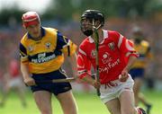 4 July 1999; Ben O'Connor of Cork in action against Brian Lohan of Clare during the Munster Senior Hurling Championship Final match between Cork and Clare at Semple Stadium in Thurles, Tipperary. Photo by Damien Eagers/Sportsfile