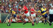 4 July 1999; Brian Corcoran of Cork in action against David Forde of Clare during the Munster Senior Hurling Championship Final match between Cork and Clare at Semple Stadium in Thurles, Tipperary. Photo by Brendan Moran/Sportsfile