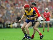 4 July 1999; Brian Lohan of Clare in action against Ben O'Connor of Cork during the Munster Senior Hurling Championship Final match between Cork and Clare at Semple Stadium in Thurles, Tipperary. Photo by Damien Eagers/Sportsfile