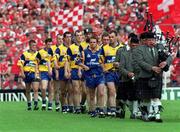 4 July 1999; The Clare Hurling team follow the Band prior to the Munster Senior Hurling Championship Final match between Cork and Clare at Semple Stadium in Thurles, Tipperary. Photo by Brendan Moran/Sportsfile