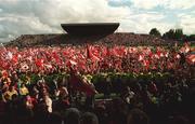 4 July 1999; Cork fans celebrate on the pitch following  the Munster Senior Hurling Championship Final match between Cork and Clare at Semple Stadium in Thurles, Tipperary. Photo by Damien Eagers/Sportsfile