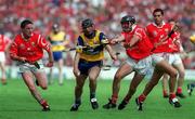 4 July 1999; David Forde of Clare in action against Michael O'Connell, left, and Brian Corcoran of Cork during the Munster Senior Hurling Championship Final match between Cork and Clare at Semple Stadium in Thurles, Tipperary. Photo by Brendan Moran/Sportsfile