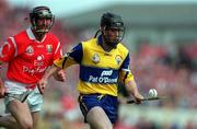 4 July 1999; David Forde of Clare in action against Brian Corcoran of Cork during the Munster Senior Hurling Championship Final match between Cork and Clare at Semple Stadium in Thurles, Tipperary. Photo by Brendan Moran/Sportsfile