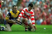 4 July 1999; Donal Og Cusack of Cork in action against Ronan O'Hara of Clare during the Munster Senior Hurling Championship Final match between Cork and Clare at Semple Stadium in Thurles, Tipperary. Photo by Brendan Moran/Sportsfile